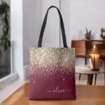Bolsa Tote Glam Monograma da Rapariga Glitter Dourada da Borg<br><div class="desc">Faux Sparkle e Glitter Elegant Monogrambook Bag,  Dourado e Burgundy. Este Livro Bag pode ser personalizado para incluir seu nome inicial e próprio e ser dado como presente para o Natal,  Doce 16 Aniversário,  Chá de panela ou Casamento.</div>