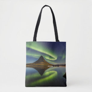 BOLSA TOTE HOMEM PERMANENTE AO LADO DO CORPO DA ÁGUA COM AUR