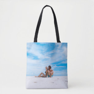 Bolsa Tote Homem sentado ao lado de uma mulher no topo do biq