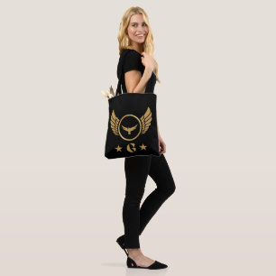 Bolsa Tote Letra G com Águia Dourada Impressa na Manga Femini