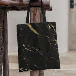 Bolsa Tote Mármore Preto e Dourado<br><div class="desc">Coordena-se com o Modelo de cartão de negócios do Designer de Mármore Preto e Dourado até 1201AM. Um fundo de mármore preto e preto em chamas cria uma estética muito chique neste saco de na moda. Arte e design © 1201AM Design Studio | www.1201am.com</div>