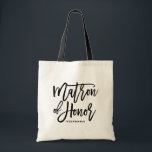 Bolsa Tote Matrão Negra de Honra Tote Bag<br><div class="desc">Saco de tota moderno e clássico,  com o script de inscrição manual MATRON OF HONOR,  preto. Personalize adicionando o nome do receptor ou a hashtag do casamento. Perfeito como presente para sua festa de casamento ou festa noiva.</div>