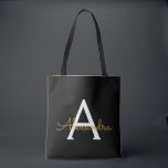 Bolsa Tote Monograma de Script Raiz Dourado de Nome Negro Mod<br><div class="desc">Preto e Dourado Elegante Adicione seu próprio nome Monograma Book Bag. Este Livro Bag pode ser personalizado para incluir seu nome inicial e próprio e ser dado como presente para o Natal,  Doce 16 Aniversário,  Chá de panela ou Casamento.</div>