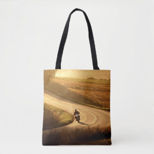 Bolsa Tote Motorcycle on countryside road at autumn evening.