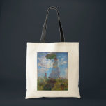 Bolsa Tote Mulher com Parasol, Monet<br><div class="desc">Oscar-Claude Monet (14 de novembro de 1840 - 5 de dezembro de 1926) era pintor francês, fundador da pintura impressionista francesa e o praticante mais consistente e prolífico da filosofia do movimento de expressar as suas percepções antes da natureza, especialmente quando aplicada à pintura da paisagem aérea. O termo "Impressionismo"...</div>