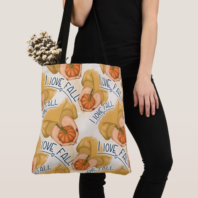 BOLSA TOTE MULHER EM SUÉCIA DOURADA SEGURANDO BOMBA PEQUENO (Close Up)