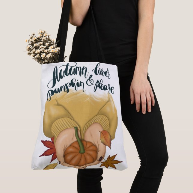 BOLSA TOTE MULHER EM SUÉCIA DOURADA SEGURANDO BOMBA PEQUENO (Close Up)