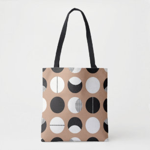 Bolsa Tote Negra, círculos brancos, fundo castanho.