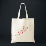 Bolsa Tote Nome do Script Vermelho Personalizado Moderno Simp<br><div class="desc">Bolsa de lona reutilizável vermelha elegante personalizada com nome personalizado para presentes de madrinhas, festas de despedida de solteira, brindes de aniversário e lembranças de viagem de meninas, e presente de formatura para armazenamento de quarto de faculdade e dormitório. Perfeito para armazenamento e transporte de equipamentos esportivos e de hobby....</div>