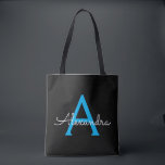 Bolsa Tote Nome Moderno do Monograma de Script Negra Azul<br><div class="desc">Preto e Azul Elegante Adicione seu próprio nome Monograma Book Bag. Este Livro Bag pode ser personalizado para incluir seu nome inicial e próprio e ser dado como presente para o Natal,  Doce 16 Aniversário,  Chá de panela ou Casamento.</div>