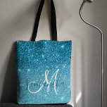 Bolsa Tote Nome Personalizado da Lista de Disparos Azul Moder<br><div class="desc">Apresentando nossa coleção de nomes personalizados de brilho azul moderno, disponível exclusivamente no Zazzle! Esta linha de produtos deslumbrante é perfeita para adicionar um toque de glamour e personalização às suas necessidades diárias. Abrace as vibrações modernas e glamourosas da nossa coleção de nomes personalizados de brilho azul moderno, disponível exclusivamente...</div>