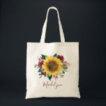 Bolsa Tote Nome Personalizado da Rosa de Girassol<br><div class="desc">Este saco bonito apresenta um design floral de aquarela moderno com um girassol de cor rústica,  flores e folhagem. Personalize-o com seu nome ou iniciais. Esta bolsa tem o mesmo design na frente e atrás.</div>