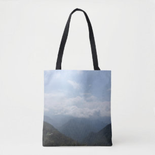 Bolsa Tote Nuvens sobre a fotografia azul do Céu Colinas