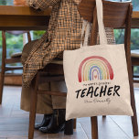 Bolsa Tote O maior professor do mundo, Rainbow<br><div class="desc">O professor personalizado apreciou a bolsa de tote com uma aquarela,  um arco-íris,  um coração vermelho,  o ditado bonitinho "o maior professor do mundo",  e o seu nome.</div>