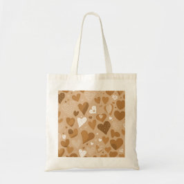 Bolsa Tote Padrão de corações em tons de marrom.