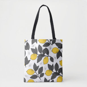 Bolsa Tote Padrão tropical sem costura com limões amarelos.