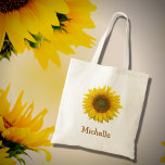 Bolsa Tote País Russo de Girassol Amarelo<br><div class="desc">Saco floral,  bonito,  com uma imagem brilhante de flor de girassol amarelo. Com letras castanhas,  você pode personalizar o texto para fazer um acessório personalizado de excelente. Perfeito para manter seus itens juntos quando você estiver em movimento.</div>