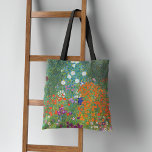 Bolsa Tote Paisagem do Jardim Flor Gustav Klimt<br><div class="desc">Um saco de tote com a pintura de arte de Gustav Klimt (1862-1918),  intitulado Jardim Flor ou Jardim Balnear (1907). Um jardim de cabanas com uma representação colorida de petúnias,  moradias e outras flores no jardim do período Art Nouveau.</div>