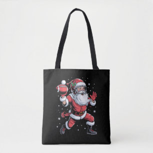 Bolsa Tote Papais noeis jogando futebol americano no Natal