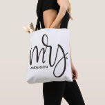 Bolsa Tote Personalizada "Sra." - elegante roteiro preto,<br><div class="desc">Apresentando a "Elegante Sra. Script - Personalizada Tote Bag, " um carrinho maravilhosamente desenhado que celebra um novo capítulo em sua vida. Esta bolsa de tote é uma mistura perfeita de elegância e funcionalidade, fazer-a um presente ideal para os recém-casados ou qualquer mulher entrando em um novo papel com orgulho...</div>