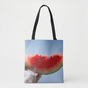 Bolsa Tote Pessoa que segura melancia fatiada