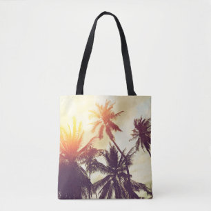 Bolsa Tote Prados tropicais de praia com palmeiras silhuetas