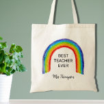 Bolsa Tote Professor de arco-íris Aquarela Obrigado Presente<br><div class="desc">Esta bolsa de Tote do Professor é decorada com um arco-íris infantil e as palavras Melhor Professor Nunca. Facilmente personalizável com o nome do seu professor favorito.</div>