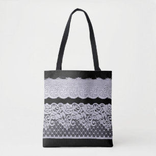 Bolsa Tote rendas brancas ornamentais, fundo preto isolado.