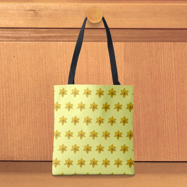 Bolsa Tote Saco de mão com padrão contínuo de narciso amarelo (Tote bag with seamless pattern of a yellow daffodil)