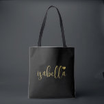 Bolsa Tote Sagrado Nome em Script Dourado Preto para Damas de<br><div class="desc">Uma bolsa preta moderna e elegante com nome em script dourado e coração que é perfeita para uma proposta de dama de honra. Suas damas de honra podem encher sua bolsa com itens essenciais para viagens da despedida de solteira,  ou com itens essenciais para levar na manhã do casamento.</div>