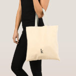 Bolsa Tote Simple Cute Initial Modern Black Monogram<br><div class="desc">Cute Tote Bag featuring a simple and modern design with your initial in black at the bottom. This custom monogram tote bag makes a great birthday gift for your sister,  a teacher or Mom for Mother's Day.</div>