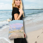 Bolsa Tote Summer Sunset Beach<br><div class="desc">Transporte-se para a alegria serena costeira de um dia de verão com este saco de impressão de arte, capturando a essência de uma cena tranquila de praia. As matizes pastéis macios de azul, rosa, roxo, bronzeado e cremes evocam a aura calmante de um pôr do sol costeiro ou do nascer...</div>