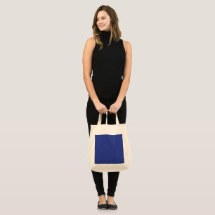 Bolsa Tote um avião voando no céu com um backgrou azul