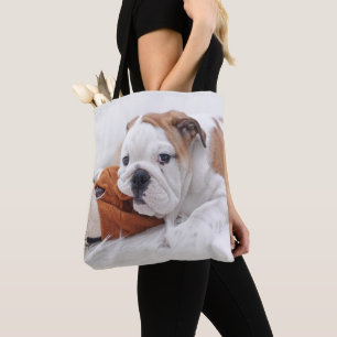 Bolsa Tote Um filhote de cachorro inglês do buldogue que jog