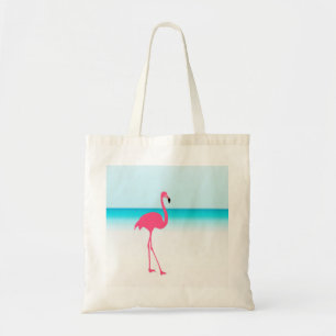 Bolsa Tote Um flamingo cor-de-rosa bonito na praia