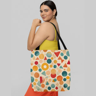 Bolsa Tote Um padrão abstrato colorido com formas geométricas