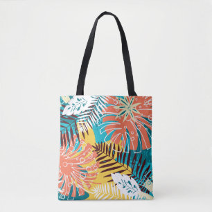 Bolsa Tote Um padrão colorido de folhas da selva tropical.