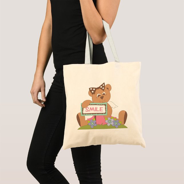 Bolsa Tote Urso de Teddy com Arco Segurando Sinal de Sorriso (Criador carregado)
