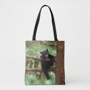 Bolsa Tote urso preto, Ursus americanus, filhote em uma árvor