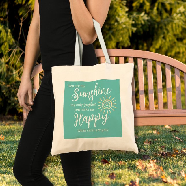 Bolsa Tote Você É Meu Sol Me Faz Feliz Sol Azul (You Are My Sunshine You Make Me Happy song lyrics on a teal blue background with yellow sun tote bag)