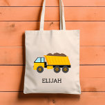 Bolsa Tote Yellow Dump Truck Kids Personalized Construction<br><div class="desc">This kids' tote bag features an illustration of a yellow dump truck. Personalize it with your child's name in black letters. Makes a great book bag!</div>