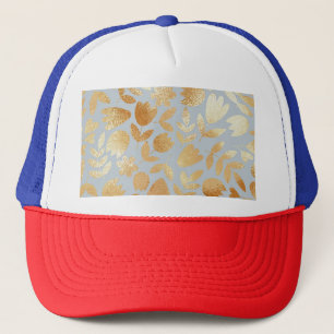 Boné Douradas flores, fundo azul, imitação de folhas.