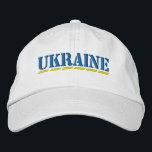 Boné Estilo de letra azul UKRAINE e estilo amarelo<br><div class="desc">UCRÂNIA Cores Azul e Amarelo Estilo de Estêncil Fonte bordada no Chapéu Branco para mostrar seu apoio à Ucrânia!</div>