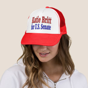 Boné Katie Britt para Senado com texto azul vermelho