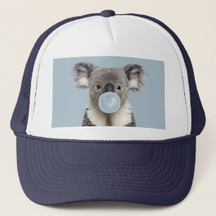 Boné Koala soprando uma pastilha azul