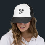 Boné Not My KPI Minimalist Snapback Trucker Hat<br><div class="desc">A high-contrast cap for a clean,  professional aesthetic. Features "Not My KPI" in a bold,  clinical,  and distressed font.</div>