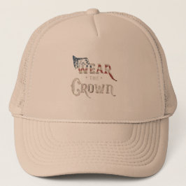 Boné que com o texto vista a coroa