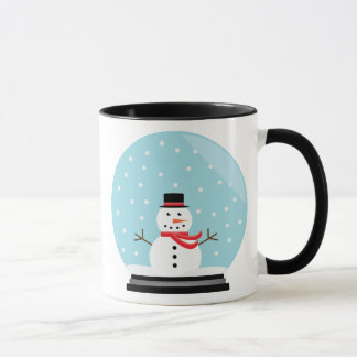 Boneco de neve em uma caneca do globo da neve