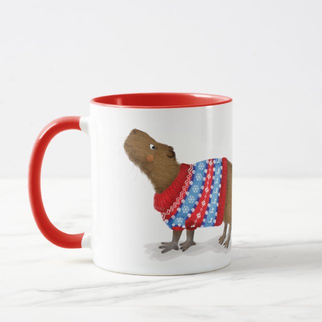 Bonita capybara numa caneca de salto de Natal (Esquerda)
