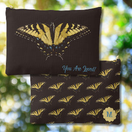 Borboleta amarela e inicial na barra de acessórios